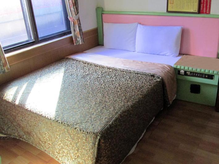 One Plus One Hotel Tchaj-pej Pokoj fotografie