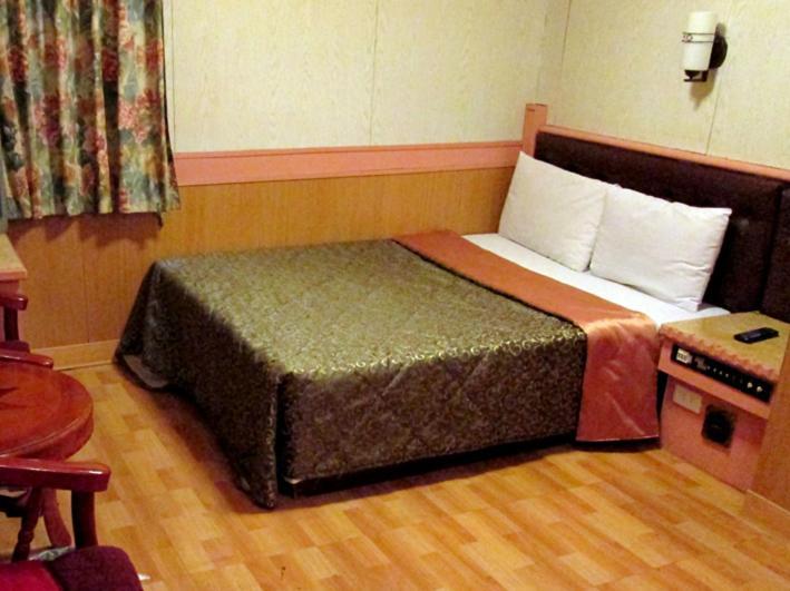 One Plus One Hotel Tchaj-pej Pokoj fotografie