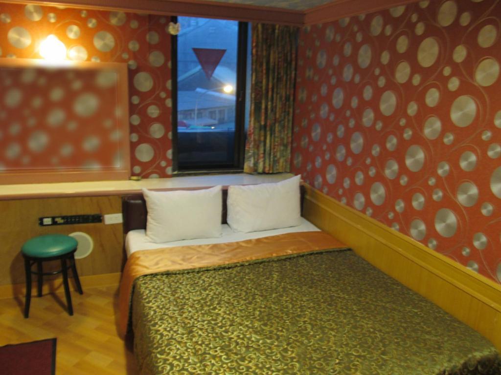 One Plus One Hotel Tchaj-pej Pokoj fotografie